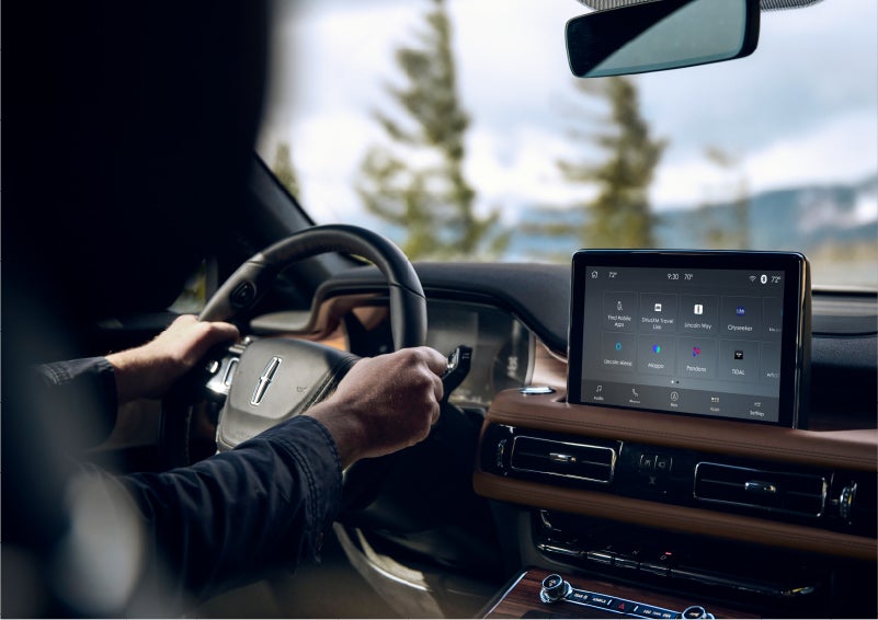 The Lincoln+Alexa app screen is displayed in the center screen of a 2023 Lincoln Aviator® Grand Touring SUV | Crossroads Lincoln of Southern Pines in Southern Pines NC